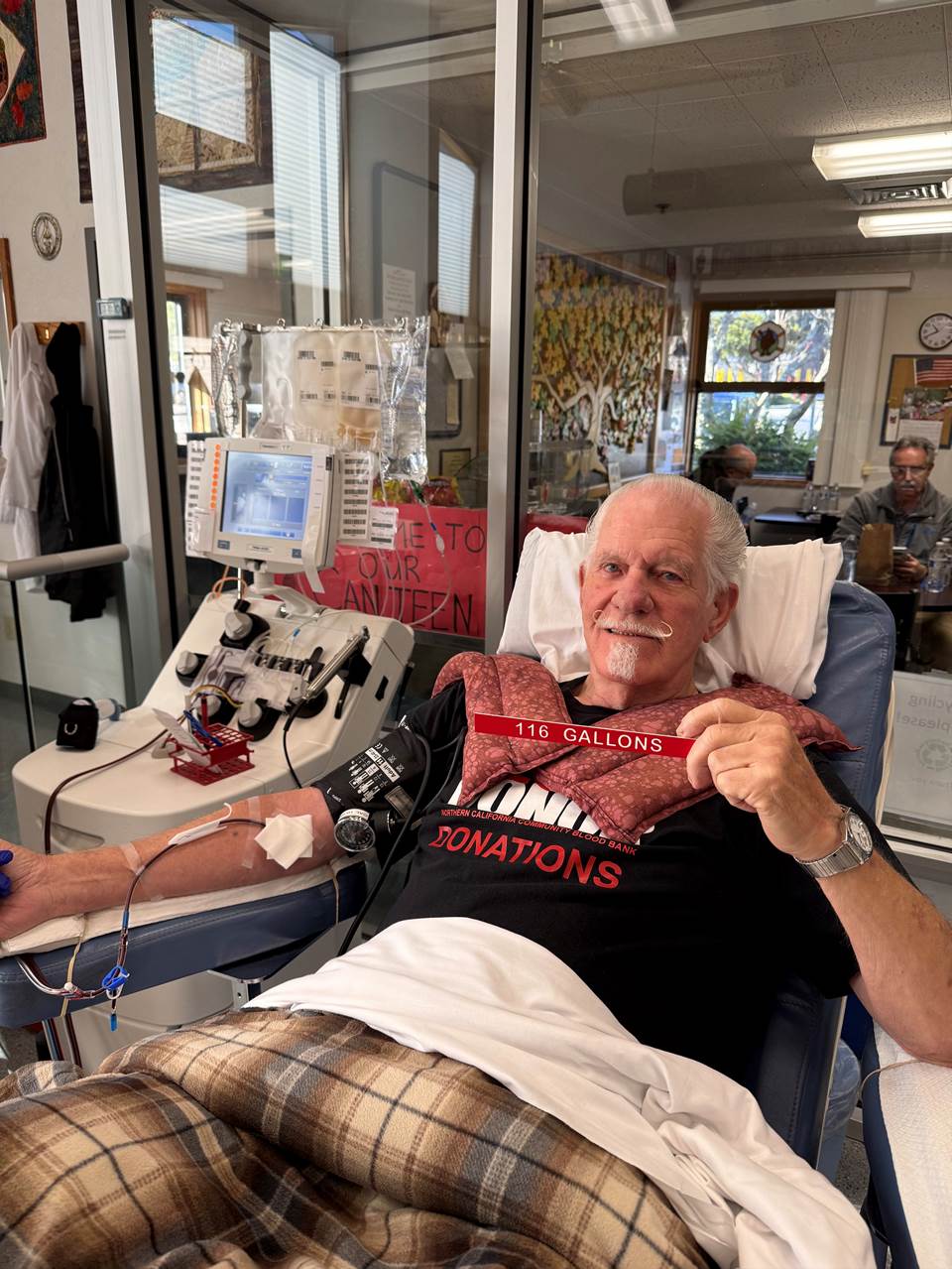 Local donor giving plasma on the apheresis machine