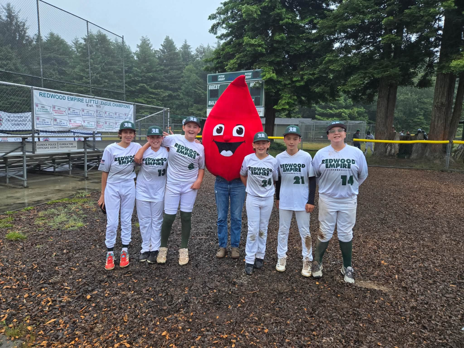 Buddy the blood-drop mascot with a Redwood Empire Little League team